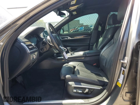 2017 BMW 7 Series 740i with VIN WBA7E2C55HG739108, listed as a Copart auction lot 53304715 with 114,510 mi miles and Salvage title. Bid and sale history available at DreamBid. Image 7.