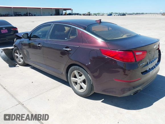 2014 Kia Optima LX with VIN 5XXGM4A77EG274839, listed as a IAAI auction lot 41976091 with 130,517 mi miles. Bid and sale history available at carsss.com. Image 3.