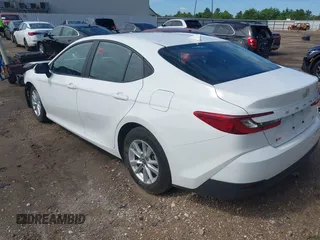 2025 Toyota Camry LE with VIN 4T1DAACK6SU082583, listed as a IAAI auction lot 42233444 with 18,935 mi miles and . Bid and sale history available at DreamBid. Image 3.