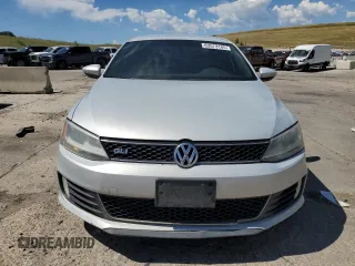 2012 Volkswagen Jetta PZEV with VIN 3VW4A7AJXCM123009, listed as a Copart auction lot 63573145 with 242,860 mi miles and Clean title. Bid and sale history available at DreamBid. Image 5.