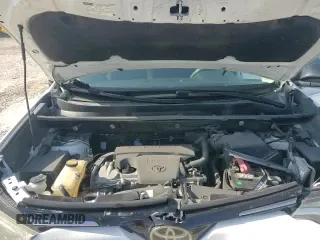 2018 Toyota RAV4 LE z VIN 2T3ZFREV8JW475231, wystawiony jako Copart lot #69939055 z przebiegiem 101 376 mil mil oraz Szkoda całkowita • Salvage title. Historia ofert i sprzedaży dostępna na DreamBid. Obrazek 13.