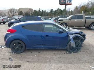 2017 Hyundai Veloster with VIN KMHTC6AD7HU318304, listed as a IAAI auction lot 41726043 with 63,050 mi miles. Bid and sale history available at carsss.com. Image 14.