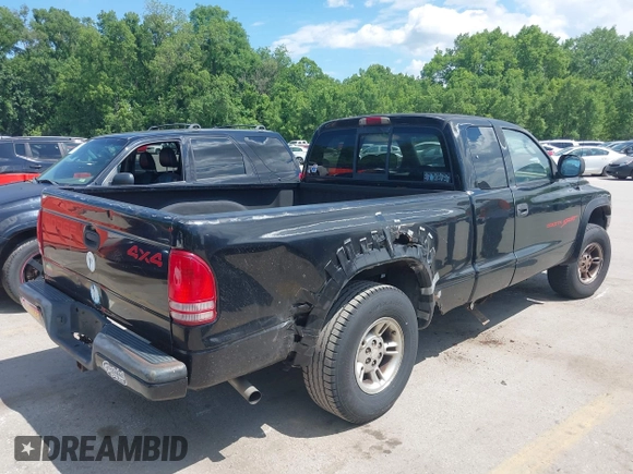 1999 Dodge Dakota SLT z VIN 1B7GG22YXXS304489, wystawiony jako IAAI lot #42326703 z przebiegiem 183 490 mil mil oraz . Historia ofert i sprzedaży dostępna na DreamBid. Obrazek 6.