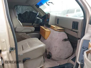1996 Ford Econoline Cargo z VIN 1FDEE14H2THB68737, wystawiony jako IAAI lot #41919471 z przebiegiem Nie podano mil oraz . Historia ofert i sprzedaży dostępna na DreamBid. Obrazek 5.