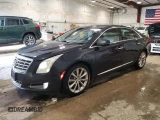 2013 Cadillac XTS Luxury with VIN 2G61P5S38D9215063, listed as a Copart auction lot 64523695 with 324,328 mi miles and Clean title. Bid and sale history available at DreamBid. Image 1.
