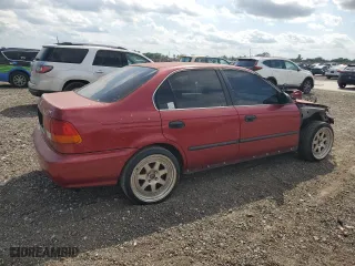 1997 Honda Civic LX "O" w/Air with VIN 1HGEJ6674VL030992, listed as a Copart auction lot 49231255 with 123,617 mi miles and Salvage Title. Bid and sale history available at carsss.com. Image 3.
