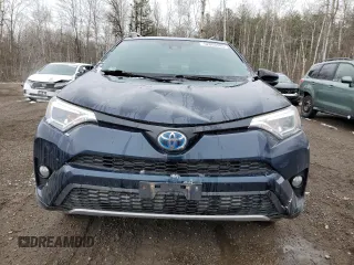 2018 Toyota RAV4 Hybrid SE with VIN JTMJJREV6JD225530, listed as a Copart auction lot 52000985 with 150,642 mi miles and Salvage title. Bid and sale history available at DreamBid. Image 5.