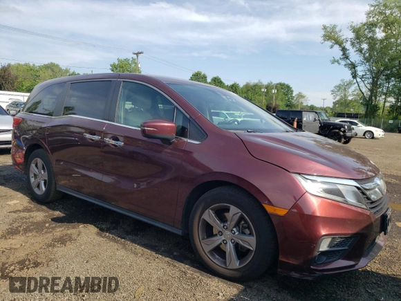 2018 Honda Odyssey EX with VIN 5FNRL6H55JB037386, listed as a Copart auction lot 63577475 with 125,498 mi miles and Salvage title. Bid and sale history available at DreamBid. Image 4.