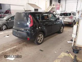 2014 Kia Soul with VIN KNDJN2A28E7110441, listed as a IAAI auction lot 41870022 with 146,981 mi miles. Bid and sale history available at carsss.com. Image 4.