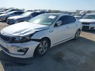 2015 Kia Optima Hybrid EX with VIN KNAGN4AD0F5085164, listed as a IAAI auction lot 41940584 with 129,841 mi miles. Bid and sale history available at carsss.com. Image 2.