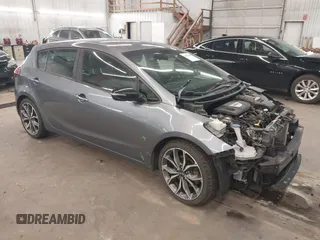 2018 Kia Forte SX with VIN 3KPFN5A36JE192941, listed as a IAAI auction lot 40938164 with 127,580 mi miles. Bid and sale history available at carsss.com. Image 1.