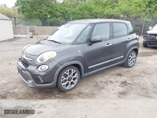 2014 FIAT 500L Trekking with VIN ZFBCFADHXEZ011031, listed as a IAAI auction lot 42094509 with 74,132 mi miles. Bid and sale history available at carsss.com. Image 2.