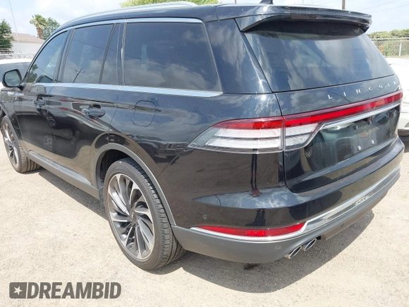 2020 Lincoln Aviator Reserve z VIN 5LM5J7XC9LGL24872, wystawiony jako IAAI lot #42112310 z przebiegiem 20 661 mil mil oraz . Historia ofert i sprzedaży dostępna na DreamBid. Obrazek 3.