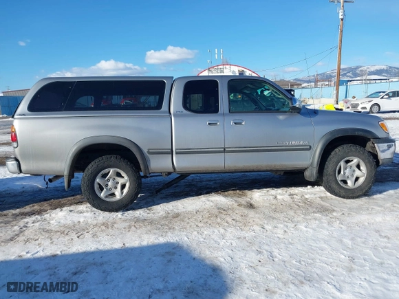 2002 Toyota Tundra SR5 with VIN 5TBBT44192S225410, listed as a IAAI auction lot 41402257 with 218,842 mi miles. Bid and sale history available at carsss.com. Image 13.