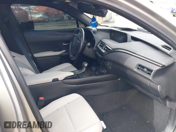 2019 Lexus UX 250h с VIN JTHU9JBH0K2002546, выставлен на аукционе IAAI как лот 41968823 с пробегом 77 014 миль миль и . История ставок и продаж доступна на DreamBid. Изображение 5.