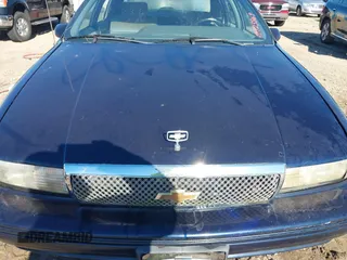 1991 Chevrolet Caprice z VIN 1G1BN53E2MW135068, wystawiony jako IAAI lot #40923869 z przebiegiem 185 732 mil mil oraz . Historia ofert i sprzedaży dostępna na DreamBid. Obrazek 10.