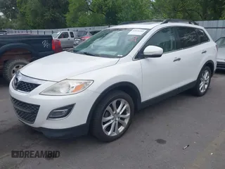 2012 Mazda CX-9 Grand Touring with VIN JM3TB3DA1C0356335, listed as a IAAI auction lot 42658284 with 141,537 mi miles and . Bid and sale history available at DreamBid. Image 2.