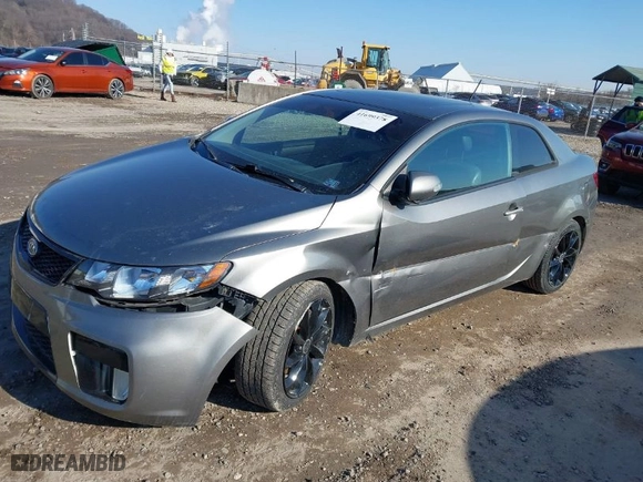 2010 Kia Forte Koup SX with VIN KNAFW6A38A5267375, listed as a IAAI auction lot 41699378 with 174,880 mi miles. Bid and sale history available at carsss.com. Image 6.