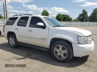 2010 Chevrolet Tahoe LTZ with VIN 1GNUKCE03AR206603, listed as a Copart auction lot 57262505 with 224,751 mi miles and Salvage title. Bid and sale history available at DreamBid. Image 4.