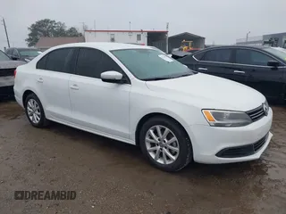 2014 Volkswagen Jetta Sedan SE w/Connectivity with VIN 3VWD07AJ7EM330558, listed as a IAAI auction lot 41353302 with 128,382 mi miles. Bid and sale history available at carsss.com. Image 1.
