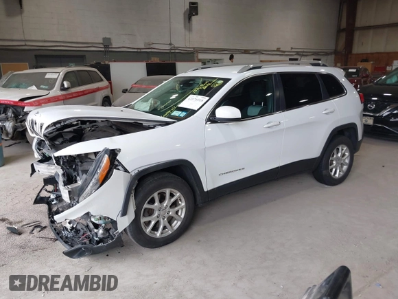 2014 Jeep Cherokee Altitude with VIN 1C4PJMCB7EW186432, listed as a IAAI auction lot 42076018 with 150,186 mi miles and . Bid and sale history available at DreamBid. Image 17.