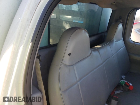 1999 Ford F-150 with VIN 1FTRF17W9XKB35000, listed as a Copart auction lot 86001964 with 155,055 mi miles and Salvage title. Bid and sale history available at DreamBid. Image 10.
