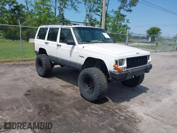 1996 Jeep Cherokee Country with VIN 1J4FJ78SXTL189940, listed as a IAAI auction lot 42020459 with 181,035 mi miles. Bid and sale history available at carsss.com. Image 1.