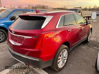 2019 Cadillac XT5 Premium Luxury AWD with VIN 1GYKNFRS2KZ251595, listed as a Copart auction lot 85396024 with 23,925 mi miles and Salvage title. Bid and sale history available at DreamBid. Image 4.