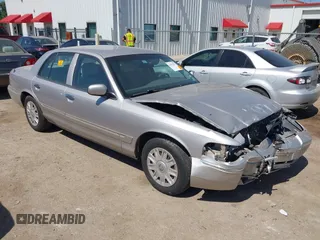 2005 Mercury Grand Marquis GS with VIN 2MEFM74W05X653375, listed as a IAAI auction lot 41995502 with 200,083 mi miles and . Bid and sale history available at DreamBid. Image 1.