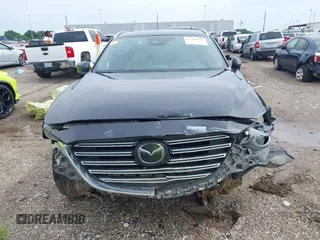 2018 Mazda CX-9 Grand Touring with VIN JM3TCADY3J0228643, listed as a IAAI auction lot 42481641 with 121,714 mi miles and . Bid and sale history available at DreamBid. Image 12.