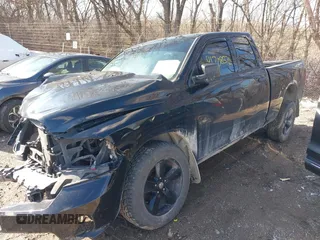 2014 Ram 1500 Express with VIN 1C6RR7FT8ES214938, listed as a IAAI auction lot 41708572 with 148,468 mi miles. Bid and sale history available at carsss.com. Image 2.