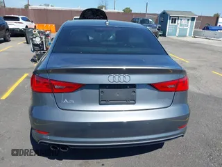 2016 Audi A3 Premium z VIN WAUA7GFF4G1051667, wystawiony jako IAAI lot #41945674 z przebiegiem 101 648 mil mil oraz . Historia ofert i sprzedaży dostępna na DreamBid. Obrazek 16.