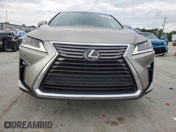 2017 Lexus RX 350 z VIN 2T2BZMCA2HC069523, wystawiony jako Copart lot #61055415 z przebiegiem 108 772 mil mil oraz Szkoda całkowita • Salvage title. Historia ofert i sprzedaży dostępna na DreamBid. Obrazek 5.
