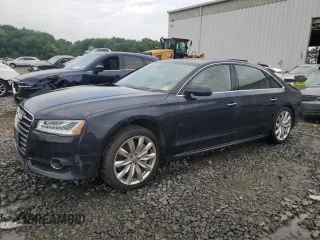 2018 Audi A8 L with VIN WAU44AFD0JN000152, listed as a Copart auction lot 62844254 with 47,325 mi miles and Salvage Title. Bid and sale history available at carsss.com. Image 1.