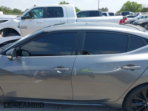2020 Nissan Maxima SR with VIN 1N4AA6EVXLC383592, listed as a IAAI auction lot 42058071 with 103,014 mi miles and . Bid and sale history available at DreamBid. Image 14.