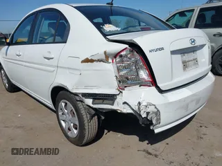 2010 Hyundai Accent GLS with VIN KMHCN4AC7AU473527, listed as a IAAI auction lot 41965592 with 104,506 mi miles. Bid and sale history available at carsss.com. Image 6.