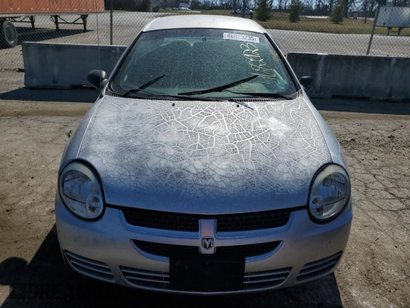 2004 Dodge Neon SXT with VIN 1B3ES56C34D551974, listed as a Copart auction lot 46829235 with 212,829 mi miles and Salvage Title. Bid and sale history available at DreamBid. Image 5.