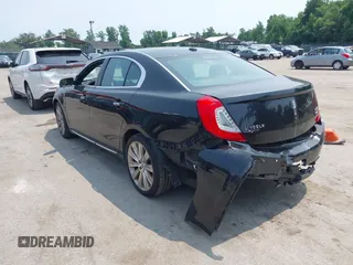2013 Lincoln MKS EcoBoost with VIN 1LNHL9FT3DG602190, listed as a IAAI auction lot 42483472 with 63,238 mi miles and . Bid and sale history available at DreamBid. Image 3.