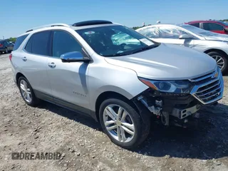 2019 Chevrolet Equinox Premier z VIN 2GNAXPEX7K6251937, wystawiony jako IAAI lot #41999362 z przebiegiem 124 207 mil mil oraz . Historia ofert i sprzedaży dostępna na DreamBid. Obrazek 1.