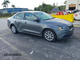 2011 Volkswagen Jetta Sedan SE w/Convenience & Sunroof with VIN 3VWDX7AJ9BM306477, listed as a IAAI auction lot 42144071 with 139,970 mi miles. Bid and sale history available at carsss.com. Image 1.