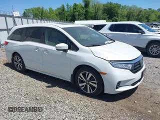 2022 Honda Odyssey Touring z VIN 5FNRL6H82NB055330, wystawiony jako IAAI lot #42033065 z przebiegiem 29 509 mil mil oraz . Historia ofert i sprzedaży dostępna na DreamBid. Obrazek 1.