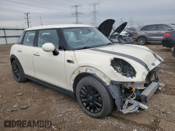 2018 MINI Hardtop 4 Door Cooper with VIN WMWXU1C56J2F80957, listed as a Copart auction lot 53713785 with 73,030 mi miles and Salvage Title. Bid and sale history available at DreamBid. Image 4.
