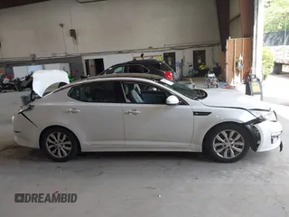 2015 Kia Optima EX z VIN 5XXGN4A7XFG415028, wystawiony jako IAAI lot #42635519 z przebiegiem 232 507 mil mil oraz . Historia ofert i sprzedaży dostępna na DreamBid. Obrazek 12.