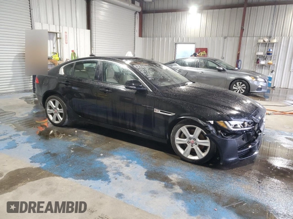 2017 Jaguar XE 25t Premium with VIN SAJAD4BG0HA971310, listed as a Copart auction lot 87680285 with 99,959 mi miles and Salvage Title. Bid and sale history available at carsss.com. Image 4.
