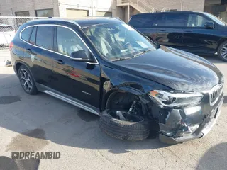 2016 BMW X1 xDrive28i with VIN WBXHT3C32G5F64687, listed as a IAAI auction lot 41852278 with 64,620 mi miles. Bid and sale history available at carsss.com. Image 1.