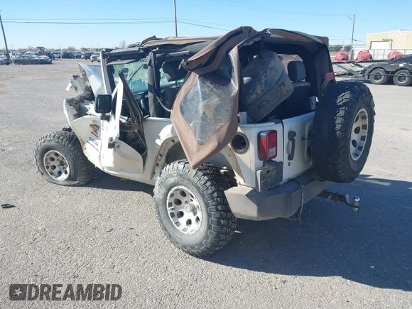 2010 Jeep Wrangler Mountain with VIN 1J4AA2D14AL173286, listed as a IAAI auction lot 41661821 with Not Provided miles and . Bid and sale history available at carsss.com. Image 3.