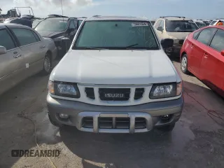 2001 Isuzu Rodeo z VIN 4S2CK57W614340766, wystawiony jako Copart lot #73891524 z przebiegiem 124 446 mil mil oraz Nie do naprawy. Historia ofert i sprzedaży dostępna na DreamBid. Obrazek 5.