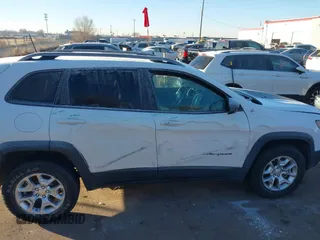 2019 Jeep Cherokee Trailhawk with VIN 1C4PJMBX8KD313712, listed as a IAAI auction lot 41448146 with 96,293 mi miles and . Bid and sale history available at DreamBid. Image 12.