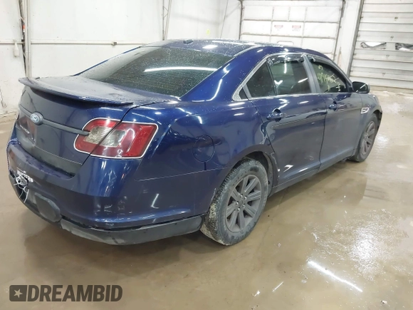 2011 Ford Taurus SE with VIN 1FAHP2DW4BG187235, listed as a IAAI auction lot 41942952 with 162,083 mi miles. Bid and sale history available at carsss.com. Image 4.