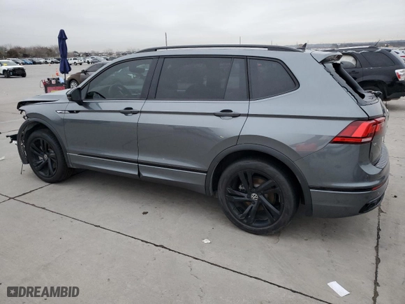2023 Volkswagen Tiguan SE R-Line Black with VIN 3VVCB7AX6PM013498, listed as a Copart auction lot 42057445 with 31,190 mi miles and Salvage Title. Bid and sale history available at carsss.com. Image 2.